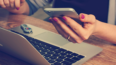 Woman holding a smartphone