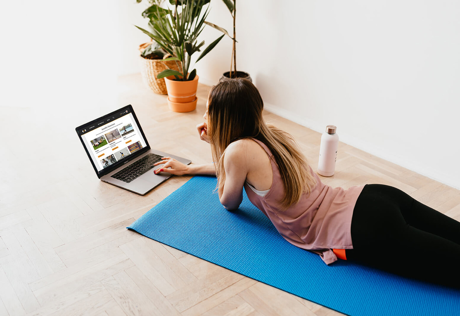 Fitness Motivator - woman using laptop